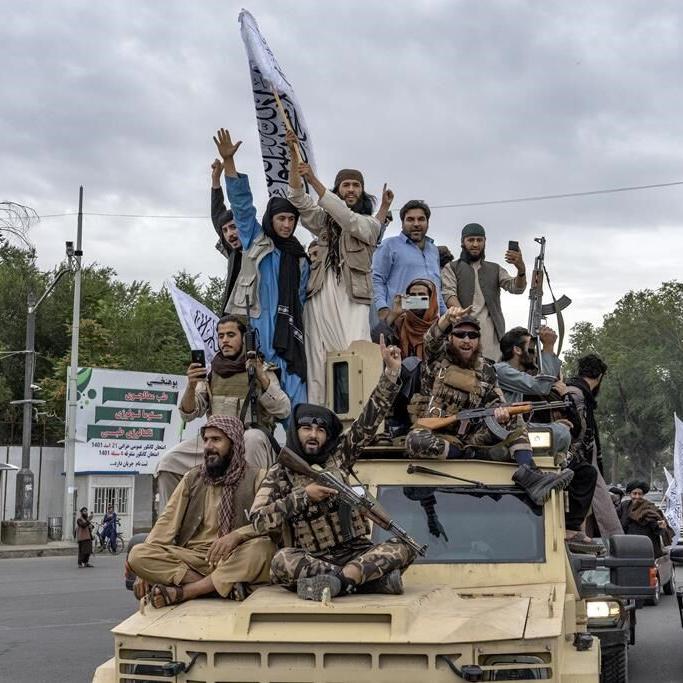 The Taliban says people in Afghanistan on previous government's visas can stay for now